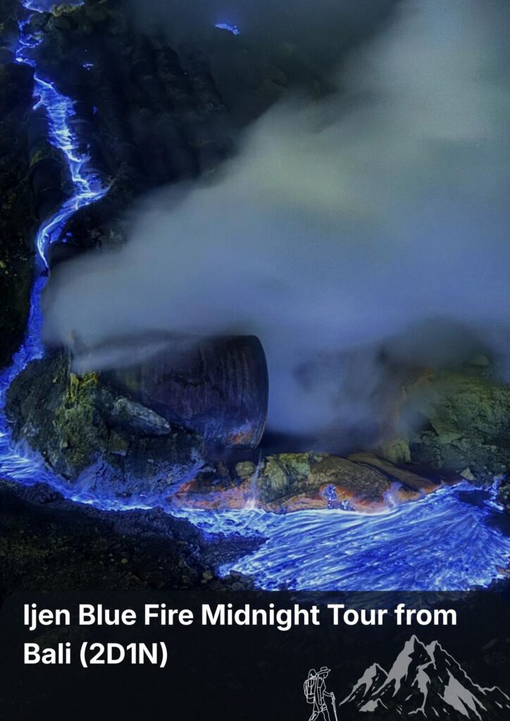 Travellers hiking at night to witness the blue fire phenomenon at Ijen Crater during a midnight tour from Bali